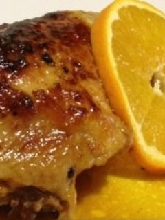 Una foto de Pollo asado con naranjas