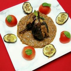 A picture of Masala Eggplant In Mint Tomato Gravy.