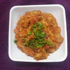 A picture of Ridge guard in tomato gravy.