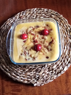 Una foto de Natillas con coulis de cereza