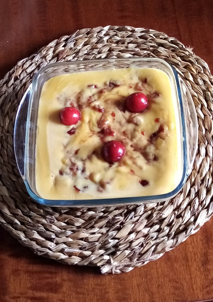 Una foto de Natillas con coulis de cereza