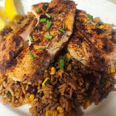 A picture of Brad's Blackened Rockfish with Dirty Rice.