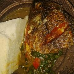 Ugali,Fish and Fried Kales A picture of Ugali,Fish and Fried Kales.