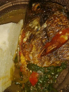 A picture of Ugali,Fish and Fried Kales.