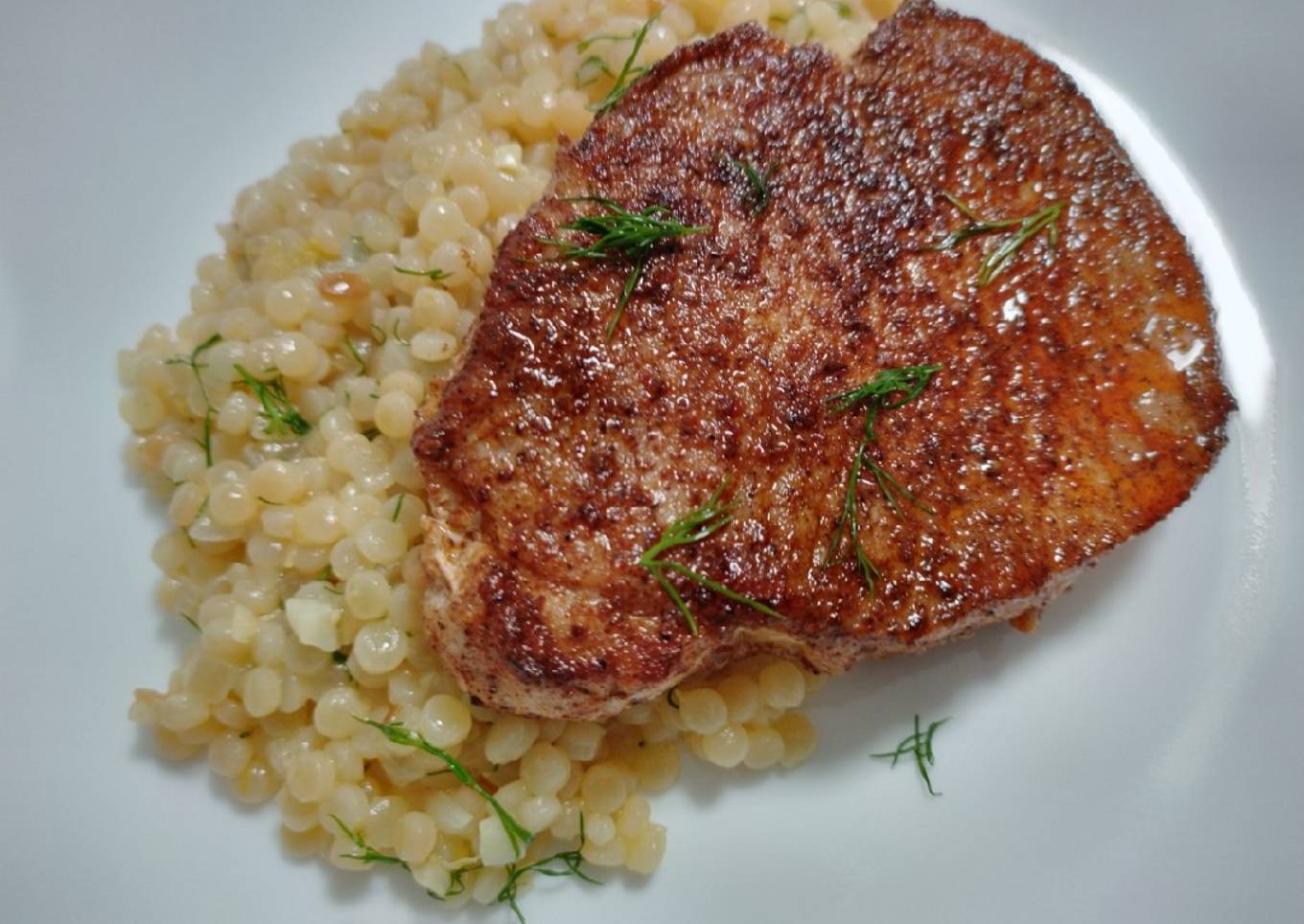 Pumpkin-spiced pork chops and couscous