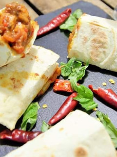 Una foto de Burritos de carne enchilada