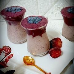 A picture of Blackberry strawberry layered smoothie.