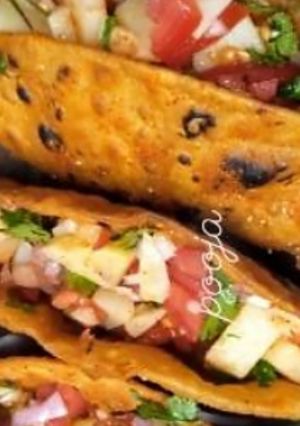 A picture of Stuffed Roti tacos.