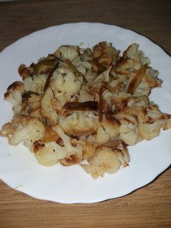 Una foto de Coliflor con ajitos tiernos
