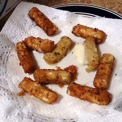 A picture of fried mozzarella sticks.