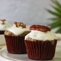 A picture of Banana Nuts Muffins with Greek Yogurt Icing.