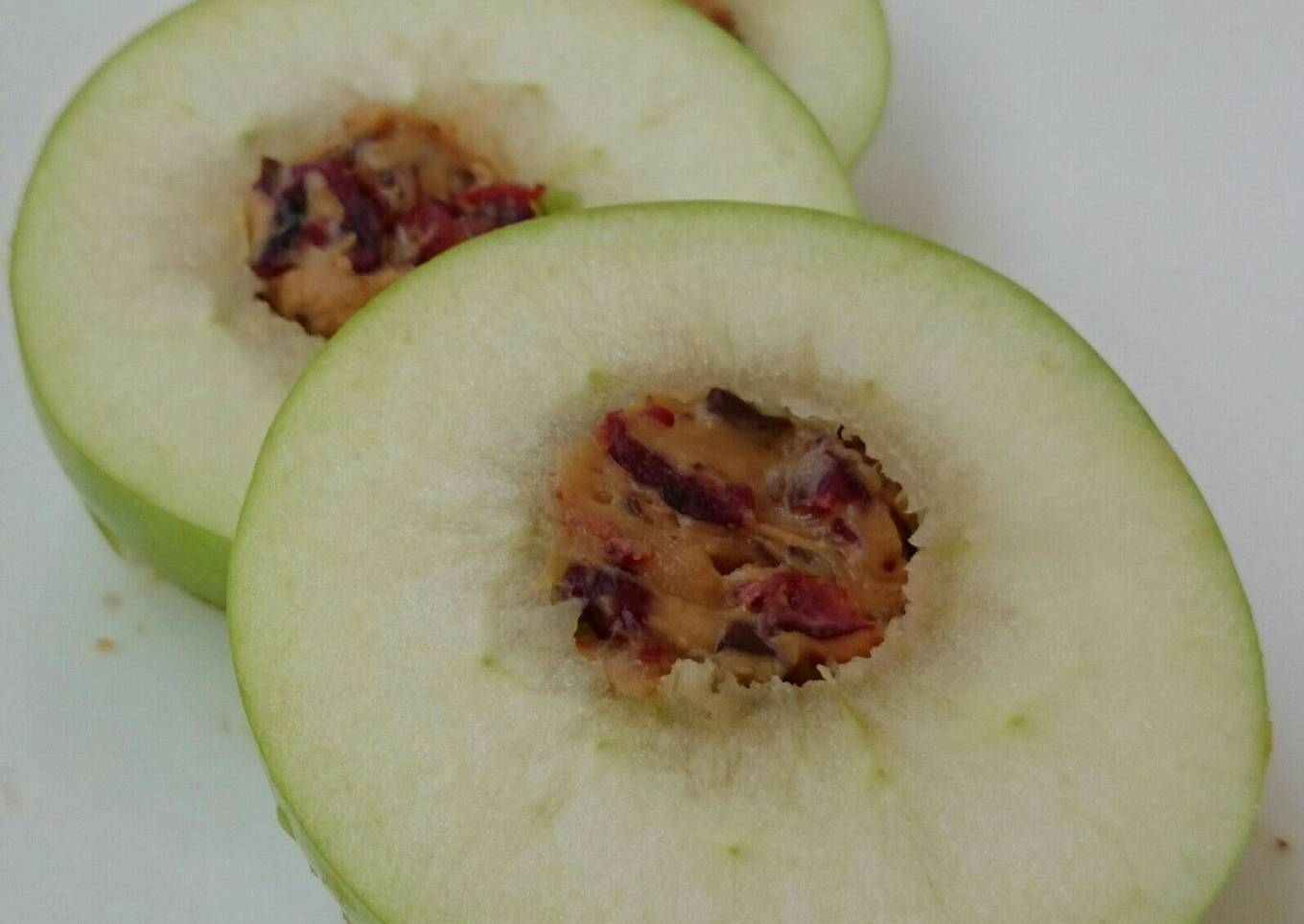 Apple With Peanut Butter And Cranberries