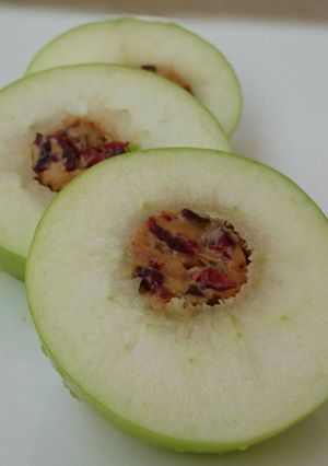 A picture of Apple With Peanut Butter And Cranberries.