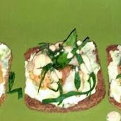 A picture of Ray's' LOBSTER & SHRIMP CROSTINI'S WITH AVOCADO CILANTRO CREMA.