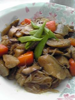 A picture of Simmered Pork Belly and Burdock Root.