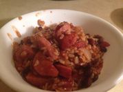 A picture of slow-cooked sausage and rice