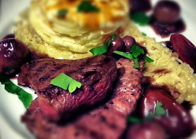 Rump Steak with wholegrain mustard dauphinoise, onion thyme puree and bourguignon sauce