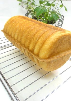 A picture of Melt in Your Mouth Round Bread with Heavy Cream.