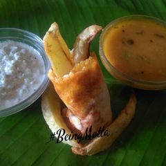 A picture of Stuffed French Fries Schezwan Cheese Dosa.