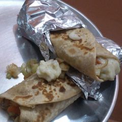 Potato wraps with cucumber relish and caramalised onions A picture of Potato wraps with cucumber relish and caramalised onions.