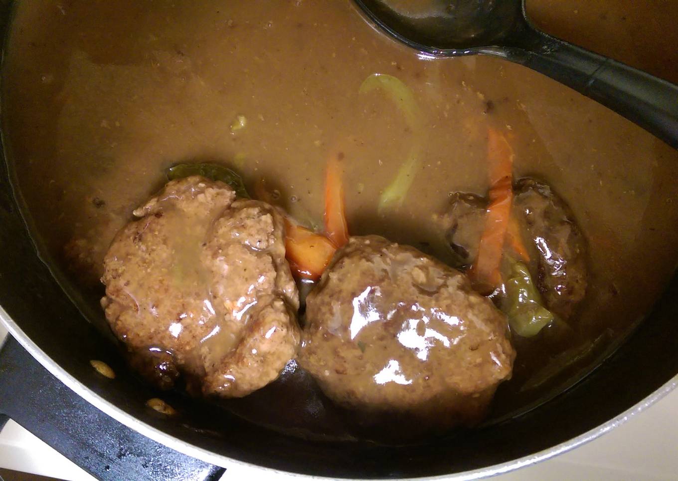 Burgers in gravy