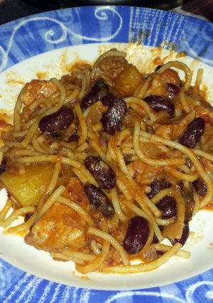 A picture of Pork and Spaghetti in Tomato Sauce.