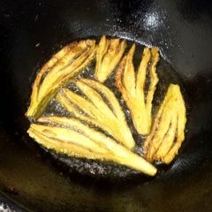 A picture of Fry bitter grud (karaly) with peels.