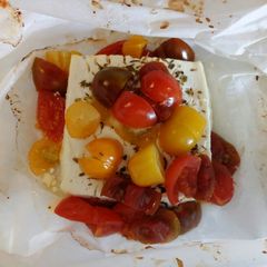 Baked feta & rainbow tomatoes A picture of Baked feta & rainbow tomatoes.