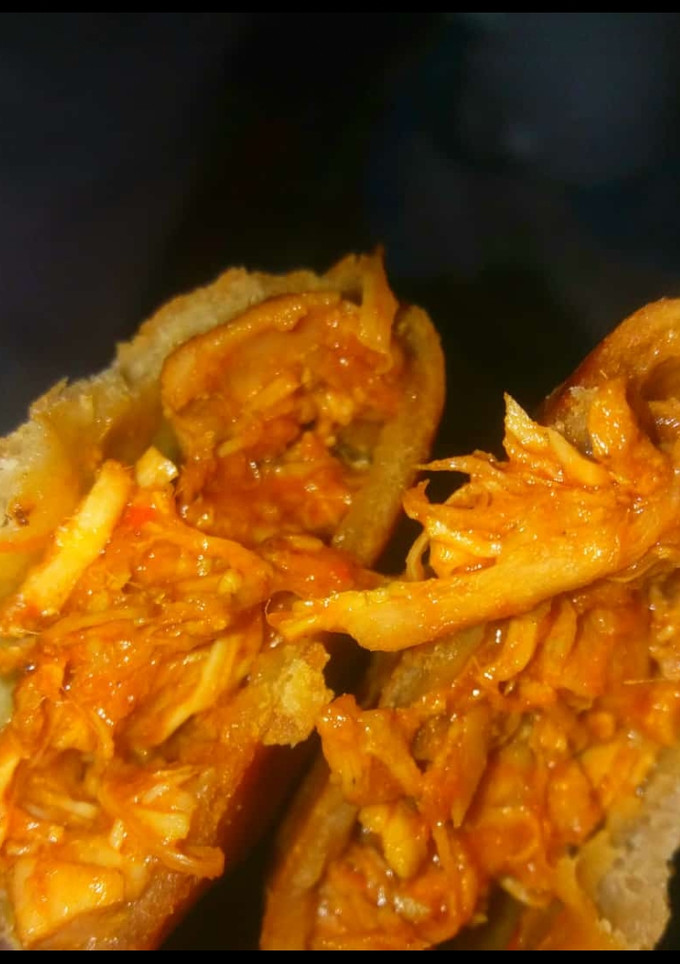 A picture of Lebanese long bread with chicken source.