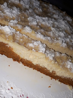 Una foto de Tarta de ricota con base de zanahoria y naranja, light