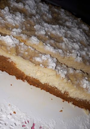 Una foto de Tarta de ricota con base de zanahoria y naranja, light