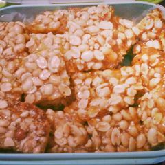 A picture of YUMMIE PEANUT BRITTLE.