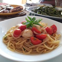 A picture of AMIEs Spaghetti with fresh Tomatoe.