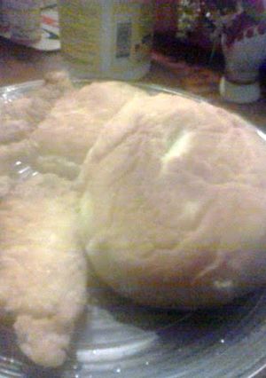 A picture of Fried fish and Trinidadian bake.