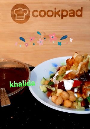 A picture of Khati meethi aloo samosa chat.