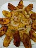 Black eyed beans with corn pudding, garnished with basilica leaf
