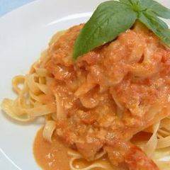 A picture of The Richness of the Crab Butter is Irresistible! Crab and Tomato Cream Pasta.