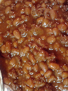 A picture of Pork and beans with hamburger.