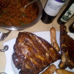 A picture of Chakalaka and braii ribs and vors.