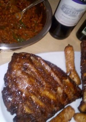 A picture of Chakalaka and braii ribs and vors.