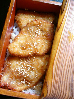 A picture of Chicken Breast Cutlets Over Rice Coated with Starch + Bread Crumbs.