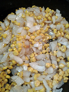 A picture of Corn and onions.