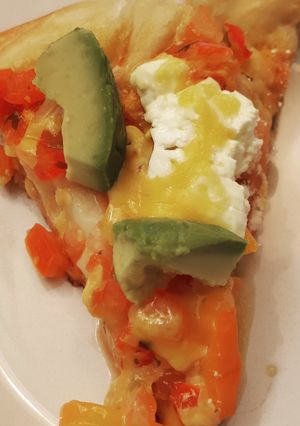 A picture of Salsa, Cheddar, Sour Cream & Avocado Pizza.