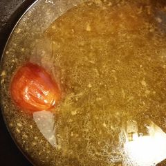 A picture of Homemade chicken stock.
