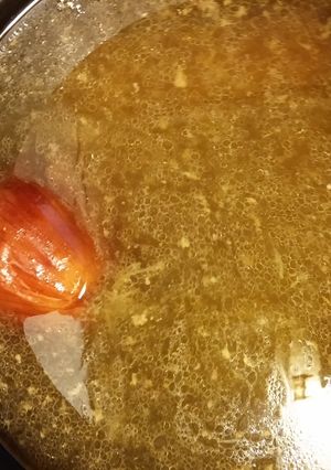 A picture of Homemade chicken stock.