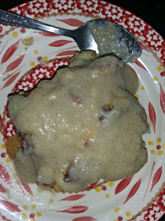 A picture of Bread pudding/w vanilla sauce.