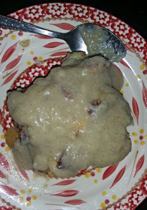 A picture of Bread pudding/w vanilla sauce.