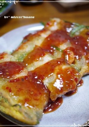 A picture of Tender & Spongy, Chrysanthemum Greens Taiwanese Shrimp Omelette.