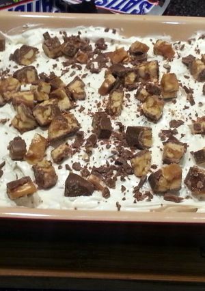 A picture of Snickers Dip (served with pretzels and apple slices).