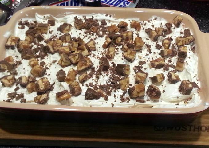 Simple Way to Make Favorite Snickers Dip (served with pretzels and apple slices)